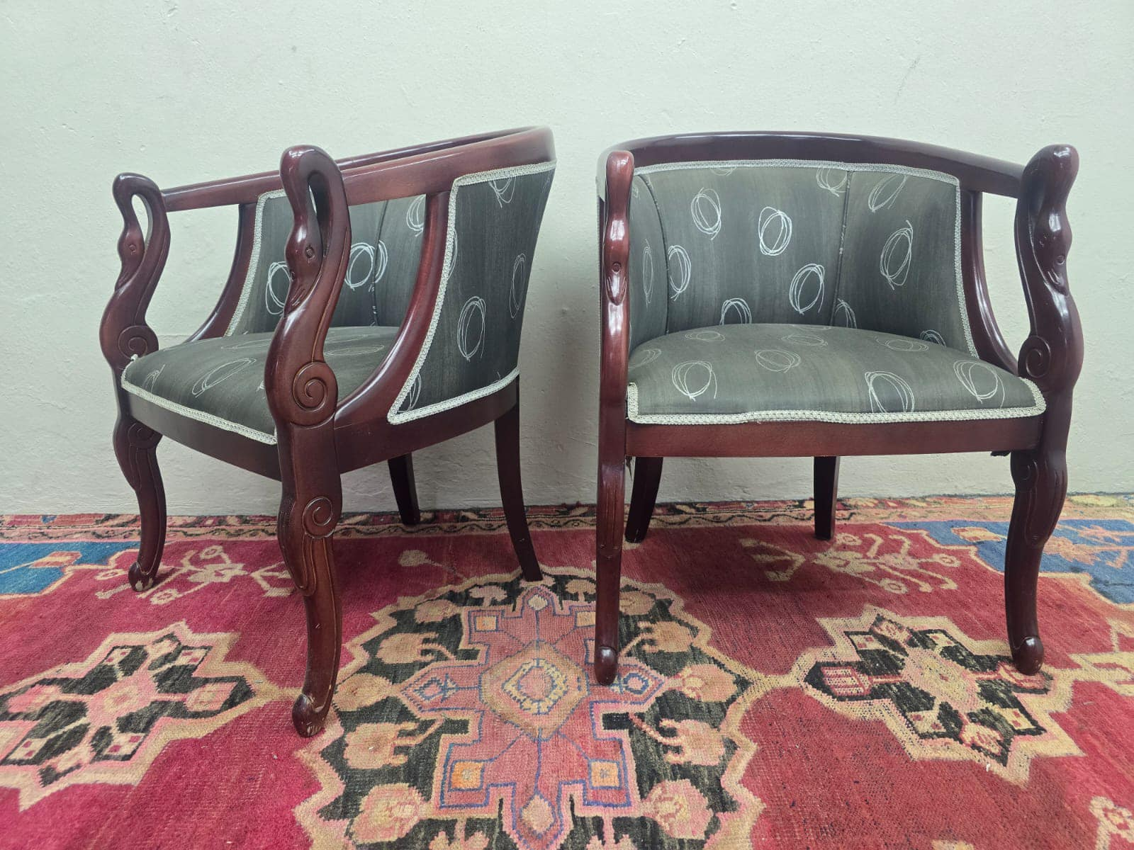 Pair of ornate Victorian Tub Chairs with solid wood frames with carved swans